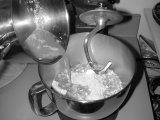 Pouring liquid ingredients into bowl