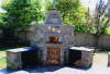 Overview of wood fired oven with fire