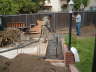 Footings and floor slabs being poured